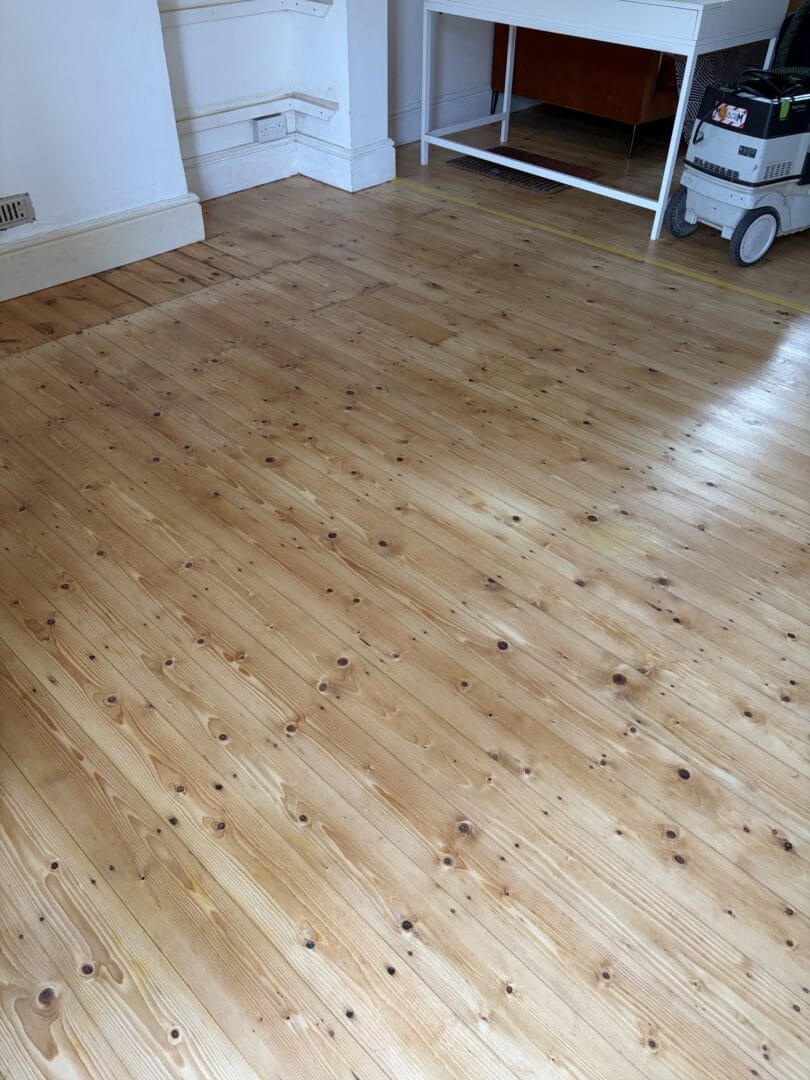 Pine wood floor sanding in the CB1 area art of clean Cambridge